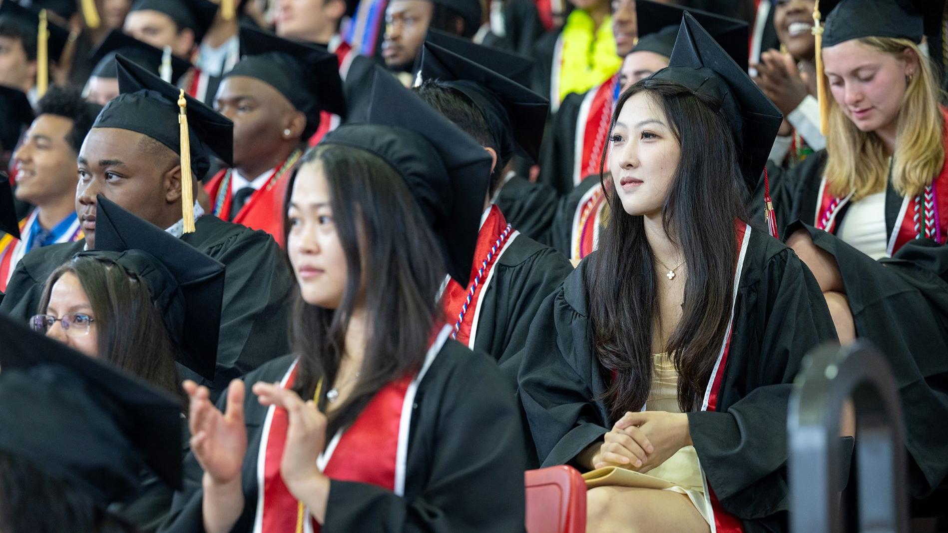 Students sitting at commencement 